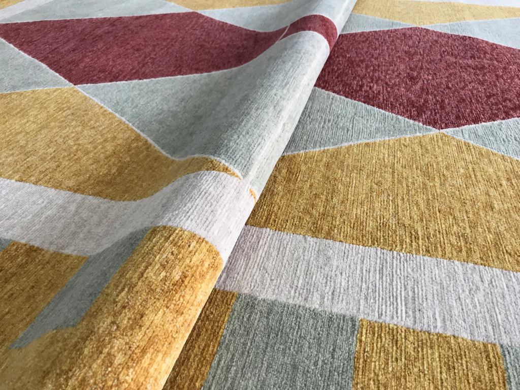 The piazza in Siena re- born as a classic tile pattern, wool also underfoot.